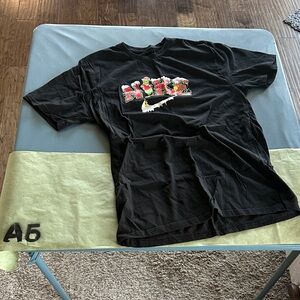 Nike Black Tee with Festive Graphic